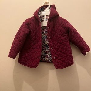 Burgundy Quilted hooded jacket W/ Floral Print Inside.